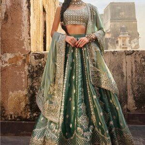 Lashkaraa 	
Dusty Teal Embroidered Organza Lehenga
